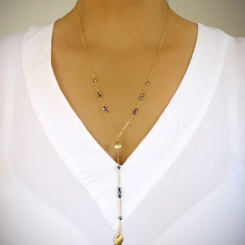 Gold seashell black diamond crystal necklace